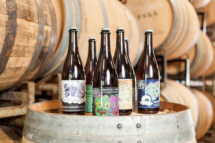 Images of Shady Oak Barrel House, and owner Steve Doty at work brewing beer.